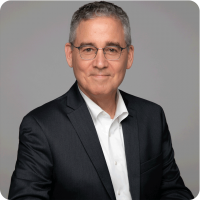 David Matis Glasses Gray Jacket Headshot