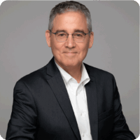 David Matis Glasses Gray Jacket Headshot