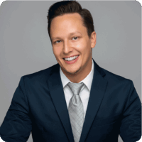 Jan Kubicka Gray Tie Blue Jacket Headshot