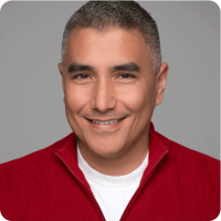 Joshua Wojcik Bright Red Sweater Headshot