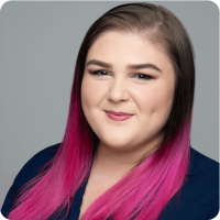 Kimberlee Buchner Magenta Hair Dimples Headshot