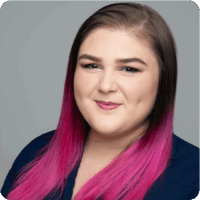Kimberlee Buchner Magenta Hair Dimples Headshot