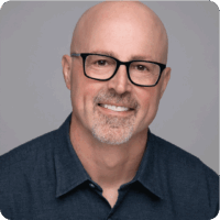 Mark Tindall Black Glasses Goatee