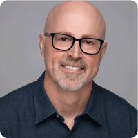 Mark Tindall Black Glasses Goatee