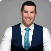Ryan Rowland Smith Paisley Tie, Blue Vest Headshot