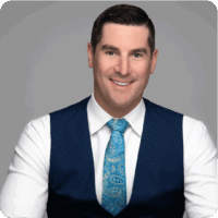Ryan Rowland Smith Paisley Tie, Blue Vest Headshot